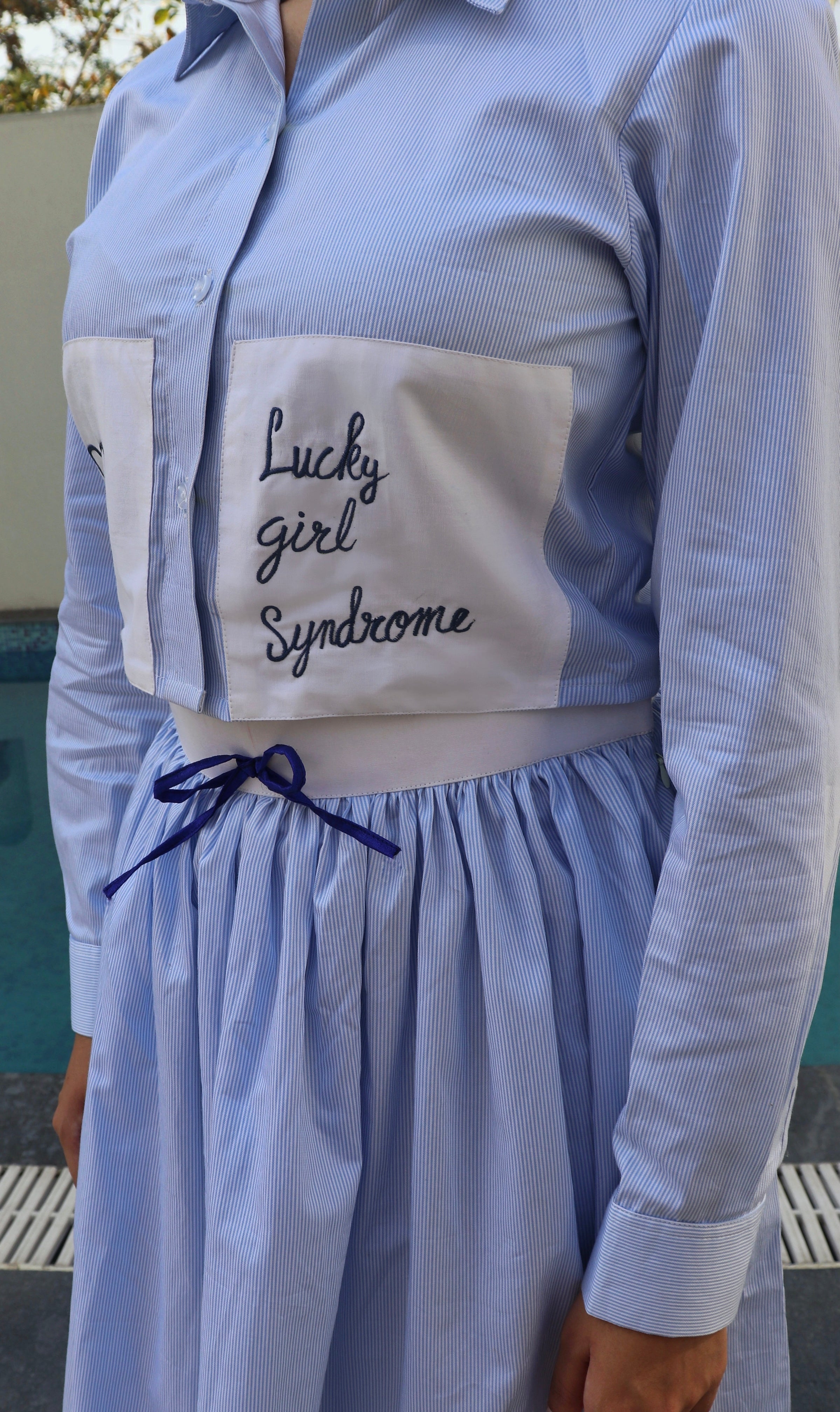 Lucky syndrome pinstripe cropped shirt