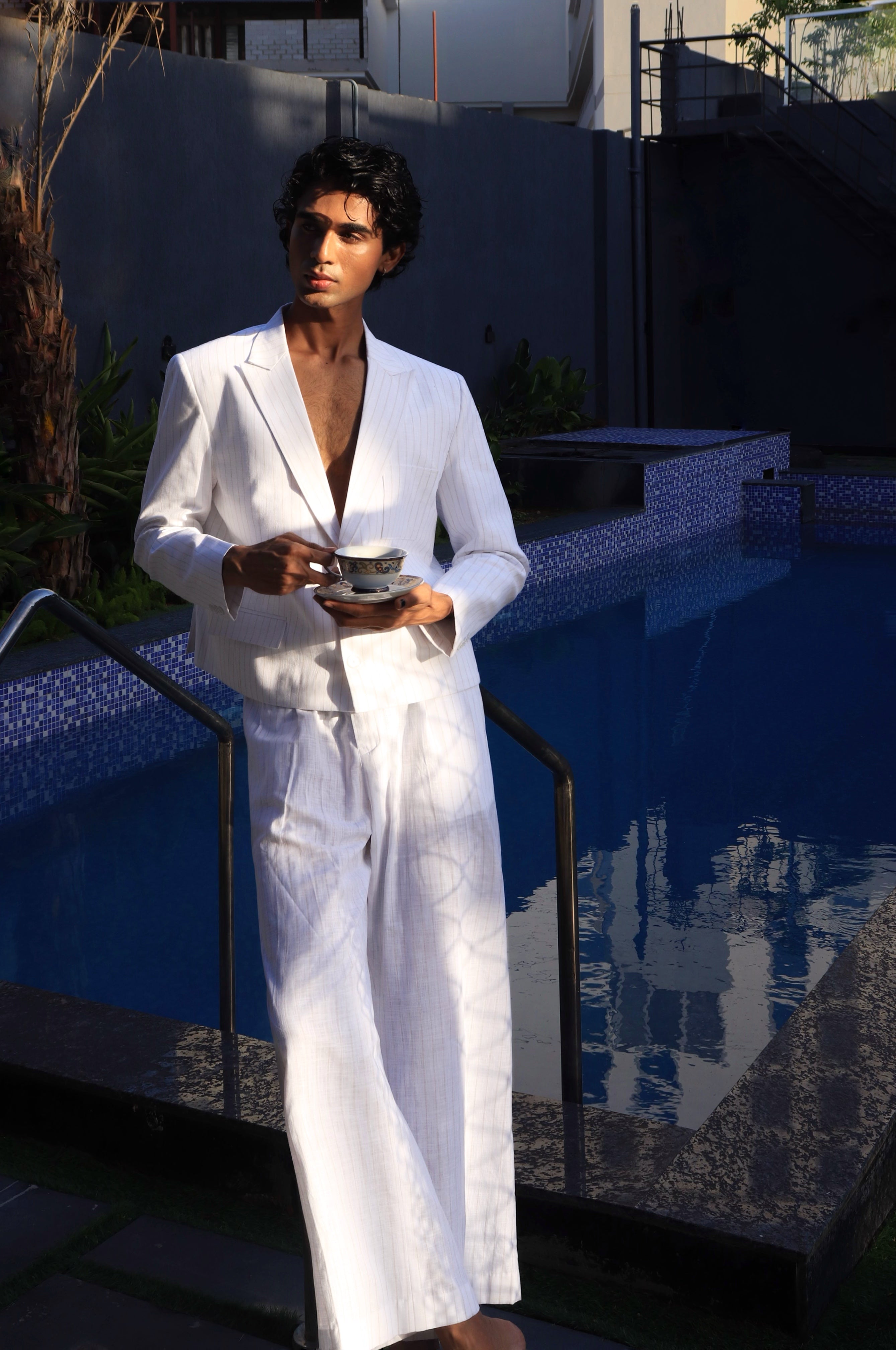 Off white pinstripe suit